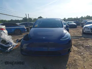 2023 Tesla Model Y Long Range with VIN 7SAYGDEE3PA114256, listed as a IAAI auction lot 42158307 with 19,975 mi miles and . Bid and sale history available at DreamBid. Image 11.