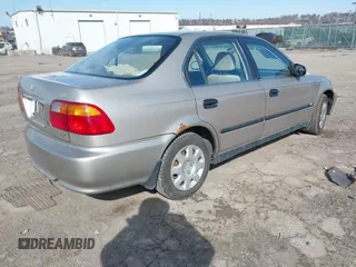 2000 Honda Civic LX with VIN 1HGEJ6679YL066102, listed as a IAAI auction lot 41585270 with 164,714 mi miles. Bid and sale history available at carsss.com. Image 4.