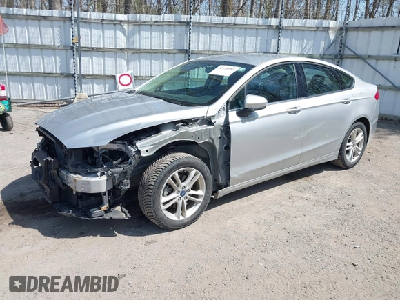 2018 Ford Fusion SE z VIN 3FA6P0H77JR226390, wystawiony jako IAAI lot #42120981 z przebiegiem 114 057 mil mil oraz . Historia ofert i sprzedaży dostępna na DreamBid. Obrazek 2.