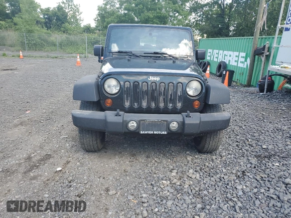 2012 Jeep Wrangler Sport with VIN 1C4AJWAG6CL256792, listed as a Copart auction lot 62634515 with 137,507 mi miles and Salvage title. Bid and sale history available at DreamBid. Image 5.