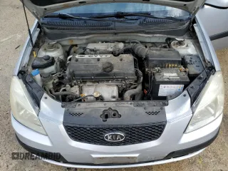 2009 Kia Rio LX with VIN KNADE223396548989, listed as a Copart auction lot 64964304 with 150,426 mi miles and Salvage Title. Bid and sale history available at carsss.com. Image 13.