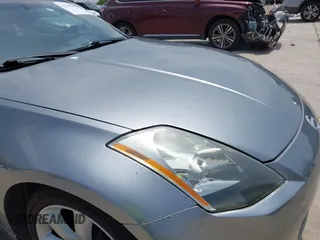 2003 Nissan 350Z Touring with VIN JN1AZ34D33T112077, listed as a IAAI auction lot 42305802 with 202,770 mi miles and . Bid and sale history available at DreamBid. Image 6.