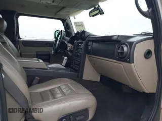 2005 Hummer H2 SUV with VIN 5GRGN23U95H129470, listed as a IAAI auction lot 42046654 with 63,489 mi miles. Bid and sale history available at carsss.com. Image 5.