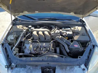 2006 Mercury Milan with VIN 3MEFM07176R612667, listed as a Copart auction lot 77498664 with 145,760 mi miles and Salvage title. Bid and sale history available at DreamBid. Image 12.