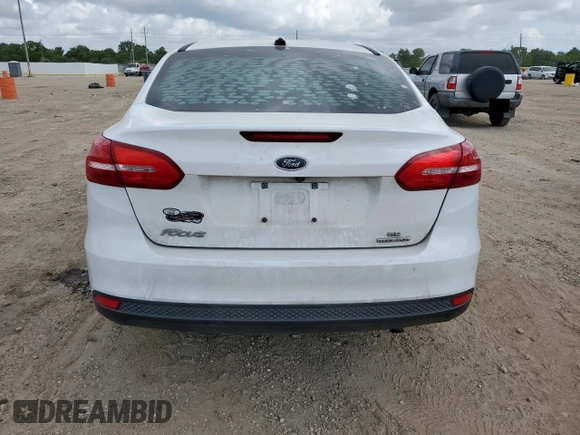 2016 Ford Focus SE with VIN 1FADP3F23GL336750, listed as a Copart auction lot 57972795 with 113,990 mi miles and Salvage title. Bid and sale history available at DreamBid. Image 6.