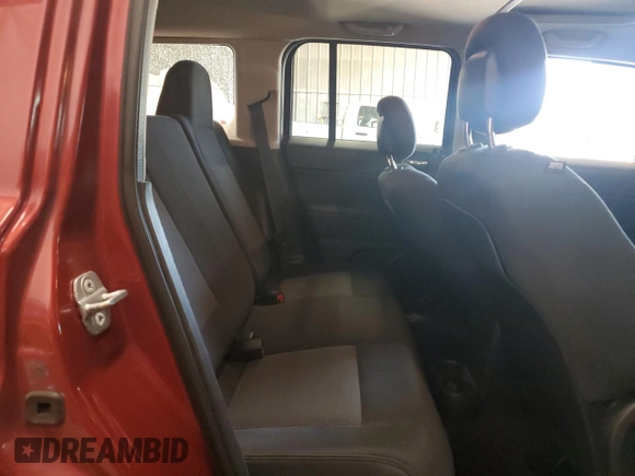 2014 Jeep Patriot Latitude with VIN 1C4NJRFB2ED734624, listed as a Copart auction lot 60675175 with 91,624 mi miles and Salvage title. Bid and sale history available at DreamBid. Image 11.