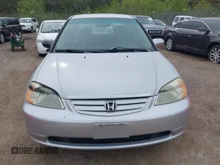 2003 Honda Civic LX with VIN 2HGES16533H571332, listed as a IAAI auction lot 42153221 with 202,926 mi miles. Bid and sale history available at carsss.com. Image 6.