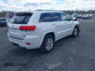 2017 Jeep Grand Cherokee Overland with VIN 1C4RJFCG6HC617770, listed as a IAAI auction lot 42041810 with 119,125 mi miles and . Bid and sale history available at DreamBid. Image 4.