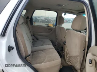 2003 Mazda Tribute LX with VIN 4F2CZ94123KM56293, listed as a Copart auction lot 65930574 with 175,150 mi miles and Salvage Title. Bid and sale history available at carsss.com. Image 10.