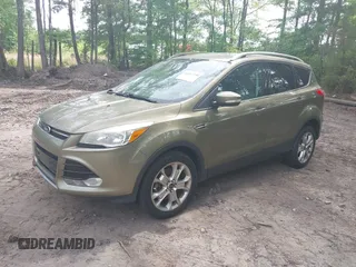 2014 Ford Escape Titanium with VIN 1FMCU9JX9EUB23972, listed as a IAAI auction lot 42217298 with 164,556 mi miles and . Bid and sale history available at DreamBid. Image 17.