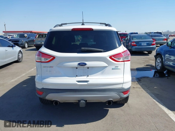 2013 Ford Escape SE with VIN 1FMCU0GX9DUB83638, listed as a IAAI auction lot 42471869 with 213,356 mi miles and . Bid and sale history available at DreamBid. Image 17.