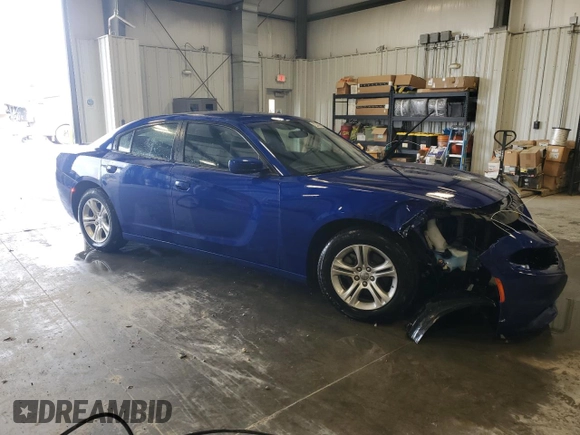 2022 Dodge Charger SXT with VIN 2C3CDXBG1NH231128, listed as a Copart auction lot 54919295 with 62,514 mi miles and Clean Title. Bid and sale history available at DreamBid. Image 4.