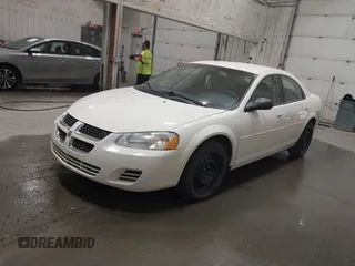 2006 Dodge Stratus SXT z VIN 1B3EL46XX6N153412, wystawiony jako IAAI lot #42096526 z przebiegiem 57 014 mil mil oraz . Historia ofert i sprzedaży dostępna na DreamBid. Obrazek 2.