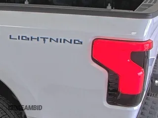 2022 Ford F-150 Lightning Pro with VIN 1FTVW1EL5NWG11725, listed as a IAAI auction lot 42832825 with 5,044 mi miles and . Bid and sale history available at DreamBid. Image 20.