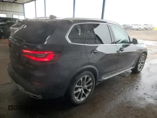 2023 BMW X5 sDrive40i with VIN 5UXCR4C03P9R22935, listed as a Copart auction lot 49732945 with 55,821 mi miles and Clean Title. Bid and sale history available at carsss.com. Image 3.