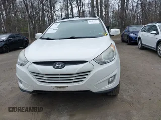 2013 Hyundai Tucson GLS with VIN KM8JU3AC5DU693550, listed as a IAAI auction lot 41919615 with 202,517 mi miles. Bid and sale history available at carsss.com. Image 12.