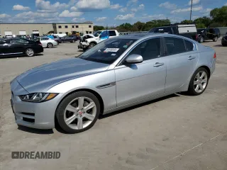 2017 Jaguar XE with VIN SAJAD4BN8HA970405, listed as a Copart auction lot 69598694 with 111,865 mi miles and Salvage Title. Bid and sale history available at DreamBid. Image 1.