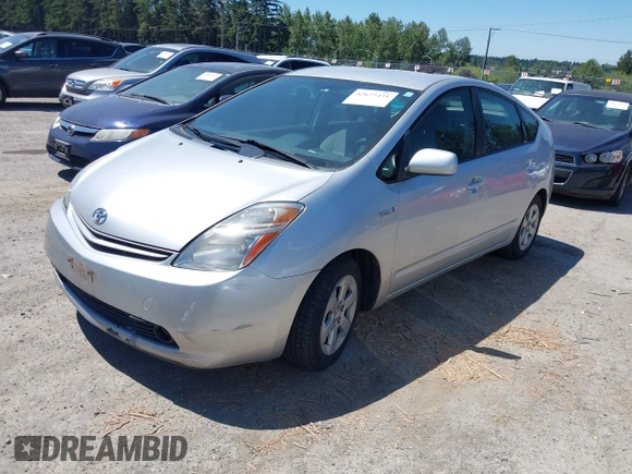 2007 Toyota Prius with VIN JTDKB20U073228218, listed as a IAAI auction lot 42677471 with 243,239 mi miles and . Bid and sale history available at DreamBid. Image 2.
