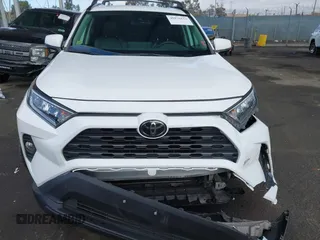 2019 Toyota RAV4 XLE with VIN 2T3W1RFV5KW051023, listed as a IAAI auction lot 40970612 with 106,359 mi miles and . Bid and sale history available at DreamBid. Image 11.