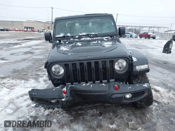 2021 Jeep Gladiator Rubicon z VIN 1C6JJTBG5ML605799, wystawiony jako IAAI lot #41190679 z przebiegiem 47 550 mil mil oraz . Historia ofert i sprzedaży dostępna na DreamBid. Obrazek 6.