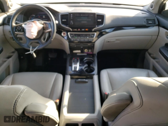 2019 Honda Pilot Touring 8-Passenger z VIN 5FNYF6H90KB000303, wystawiony jako Copart lot #52410585 z przebiegiem 129 190 mil mil oraz Szkoda całkowita • Salvage title. Historia ofert i sprzedaży dostępna na DreamBid. Obrazek 8.