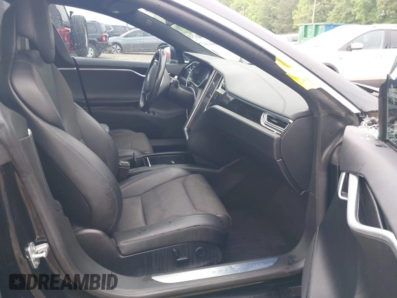 2017 Tesla Model S 60 with VIN 5YJSA1E1XHF232745, listed as a IAAI auction lot 41986834 with 89,581 mi miles and . Bid and sale history available at DreamBid. Image 5.