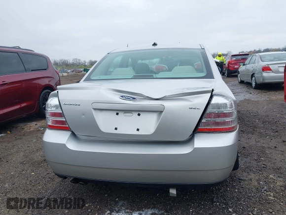 2008 Ford Taurus SEL with VIN 1FAHP24W68G122802, listed as a IAAI auction lot 42020217 with 168,265 mi miles. Bid and sale history available at carsss.com. Image 6.