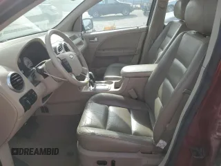 2005 Ford Freestyle Limited with VIN 1FMZK06165GA74986, listed as a Copart auction lot 53398485 with 148,459 mi miles and Salvage title. Bid and sale history available at DreamBid. Image 7.