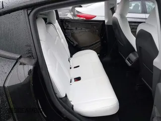 2024 Tesla Model Y Long Range z VIN 7SAYGDEE4RF014480, wystawiony jako IAAI lot #41979686 z przebiegiem 13 829 mil mil oraz . Historia ofert i sprzedaży dostępna na DreamBid. Obrazek 8.