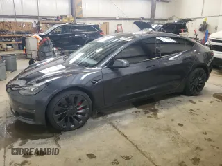 2021 Tesla Model 3 Performance with VIN 5YJ3E1EC7MF063403, listed as a Copart auction lot 50800705 with 24,319 mi miles and Clean Title. Bid and sale history available at DreamBid. Image 1.