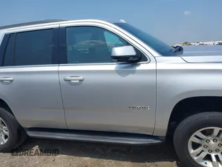 2019 Chevrolet Tahoe LT with VIN 1GNSKBKC8KR363433, listed as a IAAI auction lot 42567045 with 122,956 mi miles and . Bid and sale history available at DreamBid. Image 13.