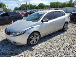 2012 Kia Forte 5-Door SX with VIN KNAFW5A31C5585738, listed as a Copart auction lot 60973804 with 107,233 mi miles and Salvage Title. Bid and sale history available at carsss.com. Image 1.