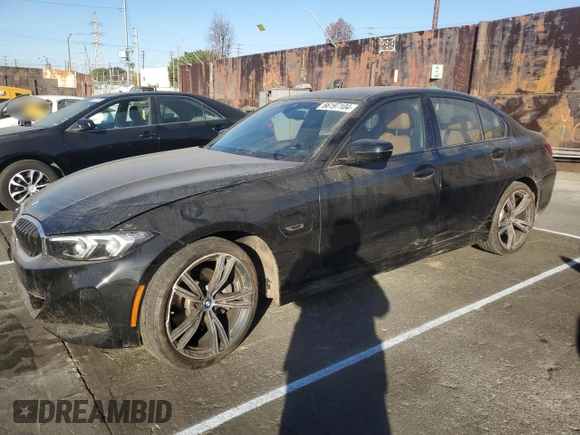 2023 BMW 3 Series 330e with VIN 3MW39FF03P8D33433, listed as a Copart auction lot 86197104 with 12,023 mi miles and Salvage Title. Bid and sale history available at carsss.com. Image 1.