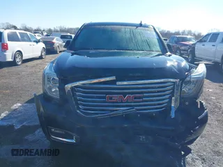2016 GMC Yukon XL SLT with VIN 1GKS2GKC0GR443634, listed as a IAAI auction lot 41379064 with 121,744 mi miles. Bid and sale history available at carsss.com. Image 6.