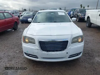 2013 Chrysler 300 with VIN 2C3CCABG2DH547247, listed as a IAAI auction lot 41755558 with 207,598 mi miles. Bid and sale history available at carsss.com. Image 12.