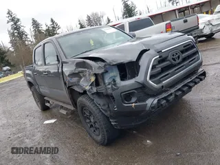 2017 Toyota Tacoma SR5 with VIN 3TMAZ5CN5HM038170, listed as a IAAI auction lot 41588399 with 152,469 mi miles. Bid and sale history available at carsss.com. Image 1.