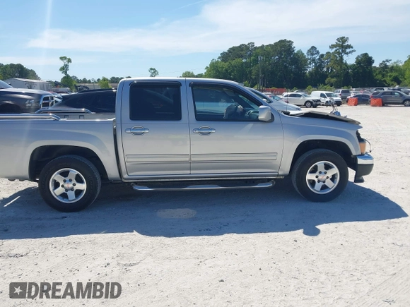 2012 GMC Canyon z VIN 1GCD5MFE3C8107823, wystawiony jako IAAI lot #42146540 z przebiegiem 100 063 mil mil oraz . Historia ofert i sprzedaży dostępna na DreamBid. Obrazek 14.