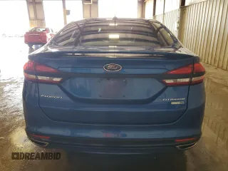 2017 Ford Fusion Titanium z VIN 3FA6P0D99HR162354, wystawiony jako Copart lot #61753395 z przebiegiem 100 678 mil mil oraz Szkoda całkowita • Salvage title. Historia ofert i sprzedaży dostępna na DreamBid. Obrazek 6.