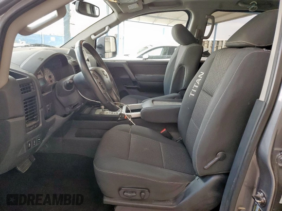 2013 Nissan Titan SV with VIN 1N6AA0EC4DN313935, listed as a Copart auction lot 57950695 with 246,851 mi miles and Salvage title. Bid and sale history available at DreamBid. Image 7.