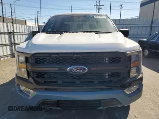 2022 Ford F-150 XL with VIN 1FTEW1EB9NKE67725, listed as a Copart auction lot 82253604 with 14,760 mi miles and Salvage Title. Bid and sale history available at carsss.com. Image 5.