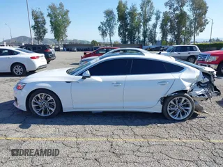 2023 Audi A5 Sportback Premium z VIN WAUABCF56PA039597, wystawiony jako IAAI lot #41979540 z przebiegiem 32 654 mil mil oraz . Historia ofert i sprzedaży dostępna na DreamBid. Obrazek 14.