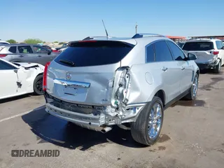 2013 Cadillac SRX Premium Collection z VIN 3GYFNEE36DS556446, wystawiony jako IAAI lot #42289824 z przebiegiem 23 988 mil mil oraz . Historia ofert i sprzedaży dostępna na DreamBid. Obrazek 6.