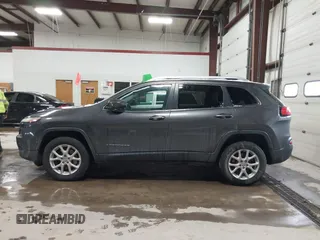 2014 Jeep Cherokee Latitude with VIN 1C4PJMCS0EW213826, listed as a IAAI auction lot 41322537 with 272,659 mi miles and . Bid and sale history available at DreamBid. Image 14.