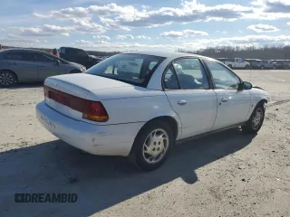 1996 Saturn SL with VIN 1G8ZK5279TZ162812, listed as a Copart auction lot 87079874 with 143,461 mi miles and Salvage title. Bid and sale history available at DreamBid. Image 3.
