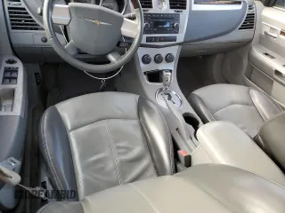 2007 Chrysler Sebring Limited z VIN 1C3LC66MX7N549501, wystawiony jako Copart lot #42108005 z przebiegiem 93 317 mil mil oraz Szkoda całkowita • Salvage title. Historia ofert i sprzedaży dostępna na DreamBid. Obrazek 8.