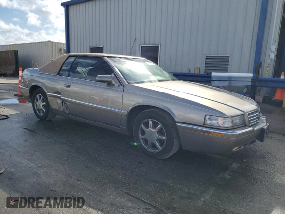 2000 Cadillac Eldorado z VIN 1G6EL12Y7YB703863, wystawiony jako Copart lot #85433244 z przebiegiem 175 416 mil mil oraz Szkoda całkowita • Salvage title. Historia ofert i sprzedaży dostępna na DreamBid. Obrazek 4.