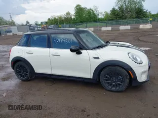 2015 MINI Hardtop 4 Door with VIN WMWXS5C52FT831291, listed as a IAAI auction lot 42179801 with 63,261 mi miles and . Bid and sale history available at DreamBid. Image 14.