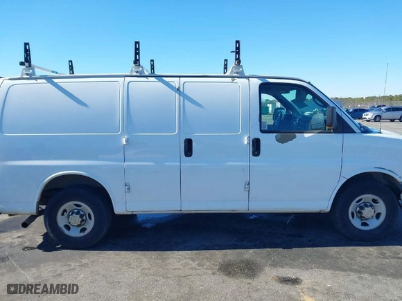 2012 Chevrolet Express Cargo Van with VIN 1GCWGFCA7C1100284, listed as a IAAI auction lot 41327810 with 211,077 mi miles. Bid and sale history available at carsss.com. Image 13.