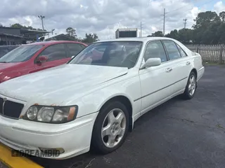 2000 Infiniti Q45 z VIN JNKBY31A0YM700503, wystawiony jako Copart lot #59358045 z przebiegiem 121 244 mil mil oraz Tytuł czysty. Historia ofert i sprzedaży dostępna na DreamBid. Obrazek 2.
