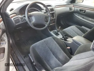1999 Toyota Solara SE with VIN 2T1CF22P6XC159638, listed as a Copart auction lot 71815564 with 217,196 mi miles and Salvage Title. Bid and sale history available at DreamBid. Image 8.